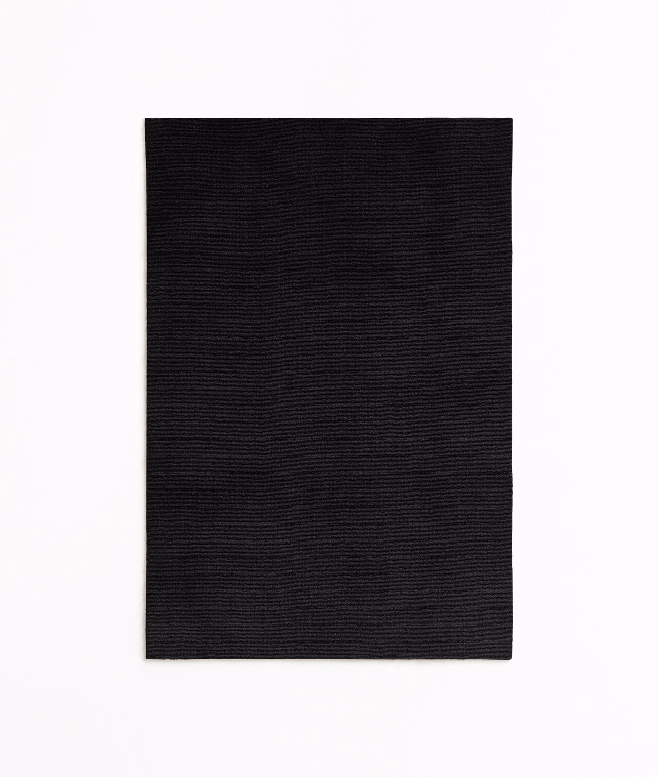 Close-up of Sansone Nero’s near-black velvet with a quiet directional sheen