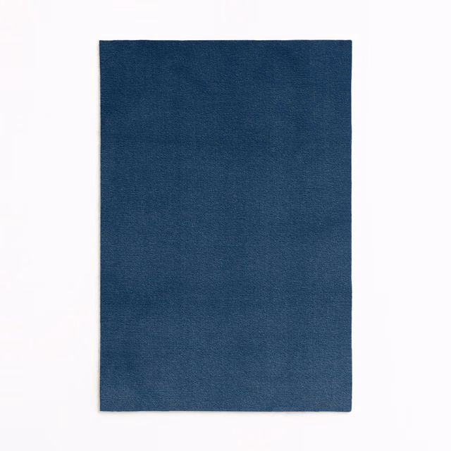 Deep navy-blue velvet swatch with a softly mottled, light-catching nap