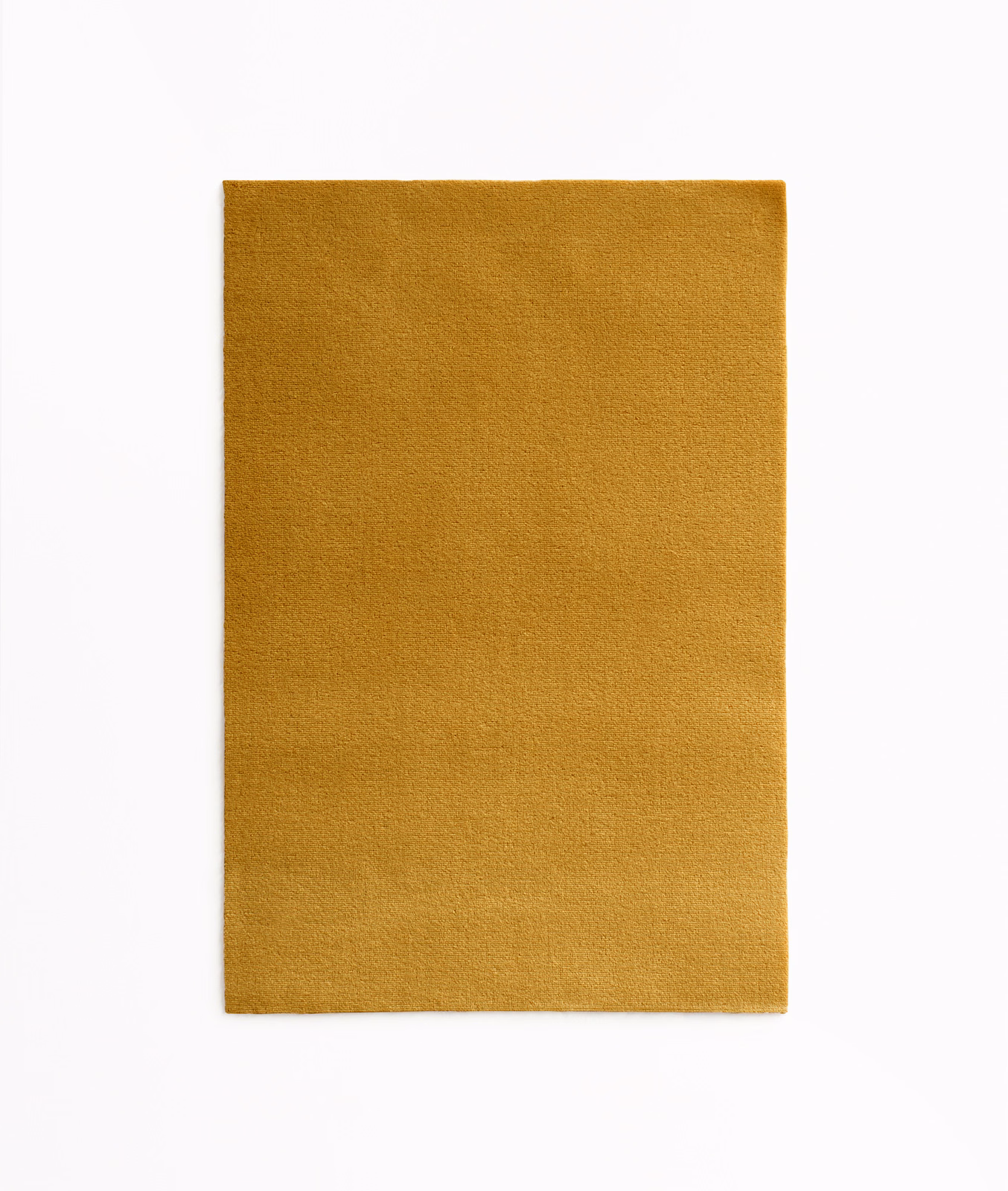 Plain warm ochre-gold velvet swatch with a softly brushed, subtly shaded surface