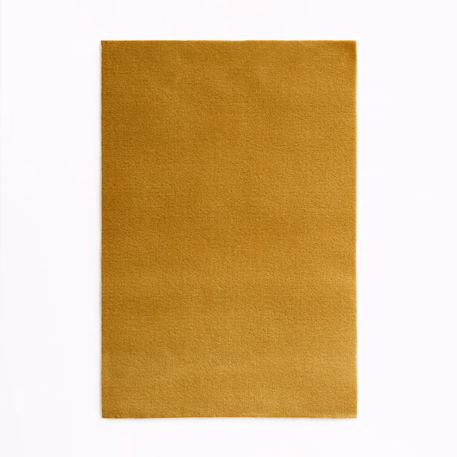Plain warm ochre-gold velvet swatch with a softly brushed, subtly shaded surface