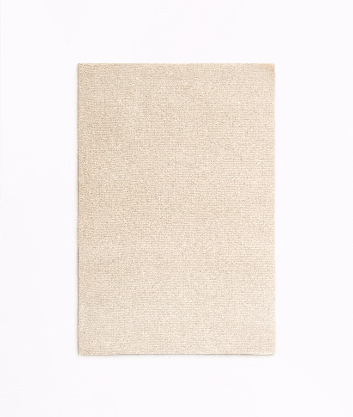 Pale oyster-cream velvet with a softly brushed, low-sheen surface