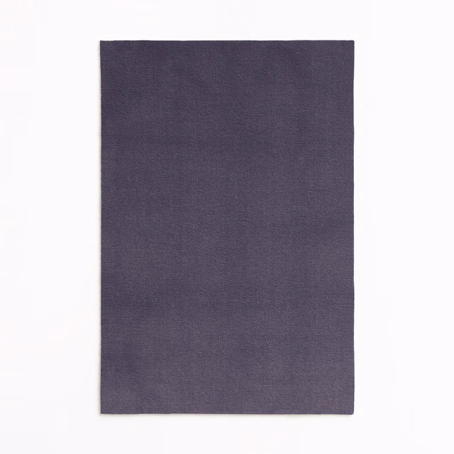 Smoky plum-purple velvet swatch with subtle directional nap and quiet tonal variation