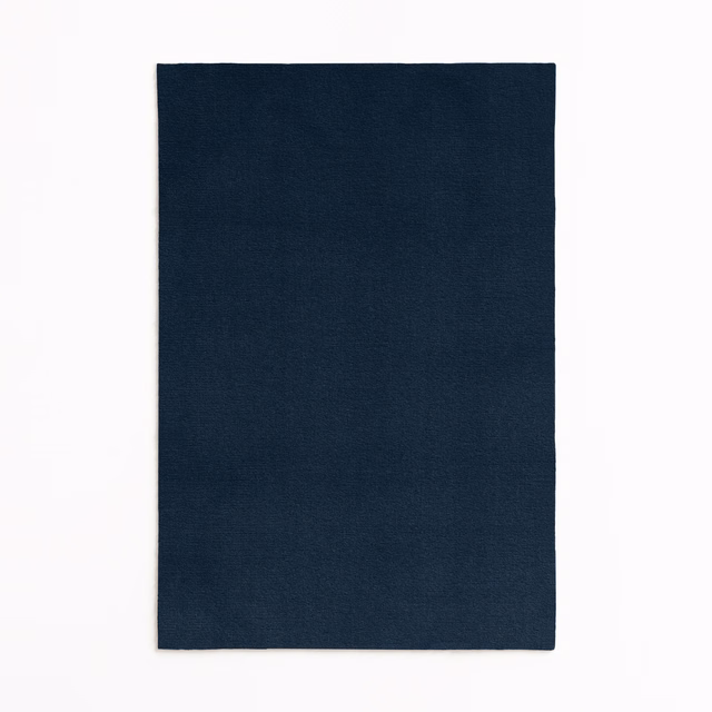 Deep ink-navy velvet swatch with a softly brushed plain surface