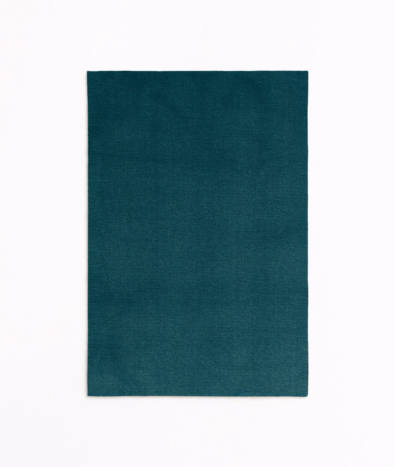 Deep petrol teal velvet swatch showing a fine nap and subtle light-shift