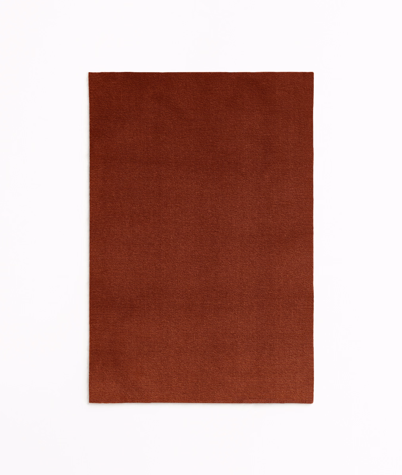 Plain deep terracotta velvet swatch with a softly shaded brushed nap