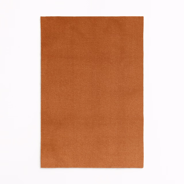 Plain burnt-terracotta velvet swatch with a softly brushed, light-catching surface