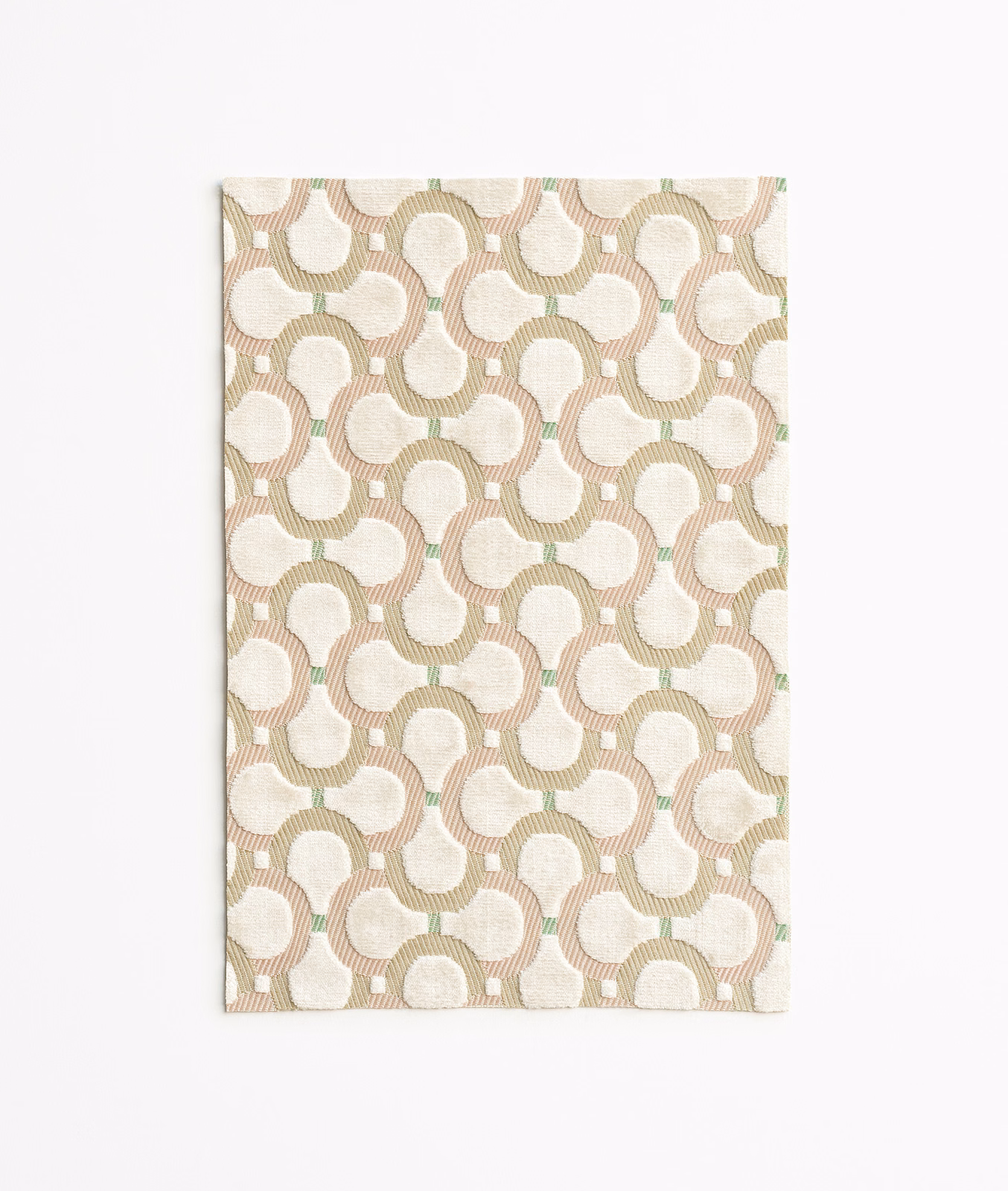 Cream geometric velvet with sage and blush interlocking loops over ribbed texture