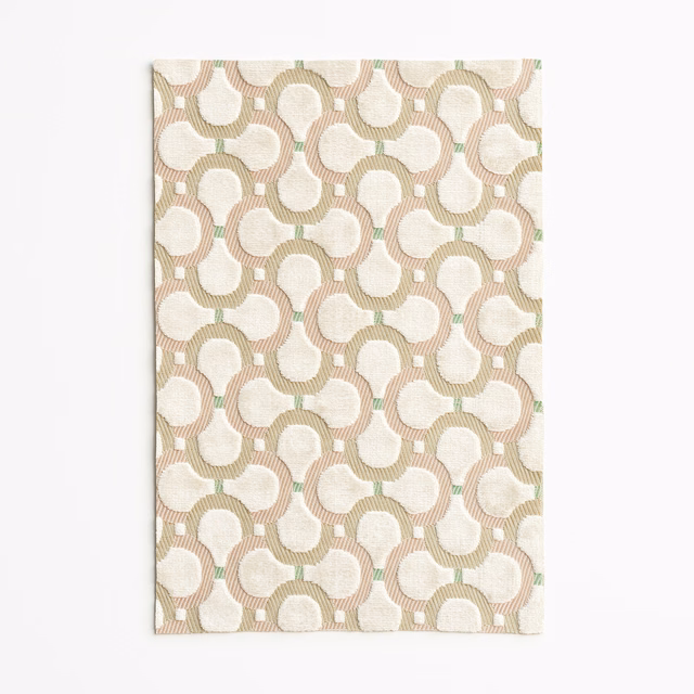 Cream geometric velvet with sage and blush interlocking loops over ribbed texture
