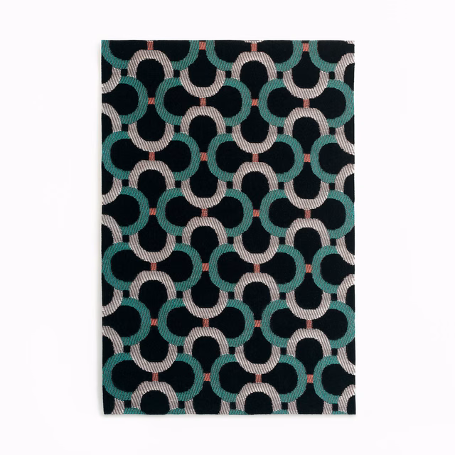 Dark teal velvet with interlocking loops, blush arcs and coral accents