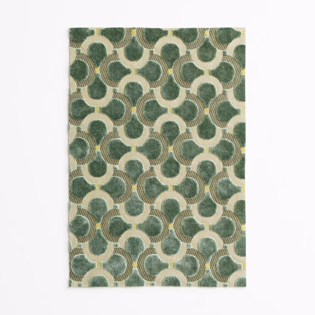 Jade velvet with cream loops, pale-gold lines and softly shaded geometric fan motifs