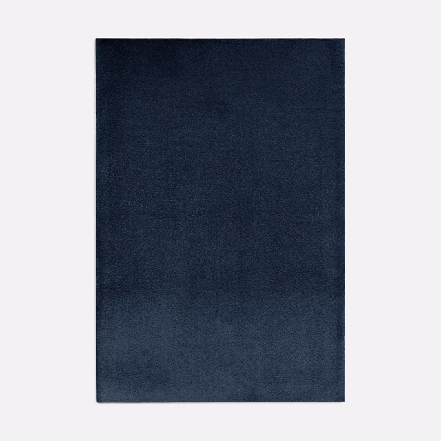 Deep Prussian blue velvet swatch showing a soft, subtly shifting plain nap