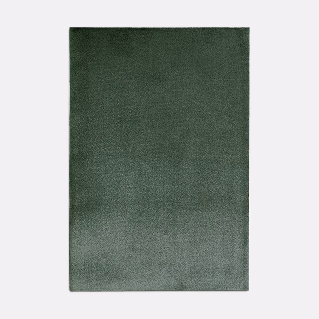 Deep bottle-green plain velvet with softly shifting pile and low sheen