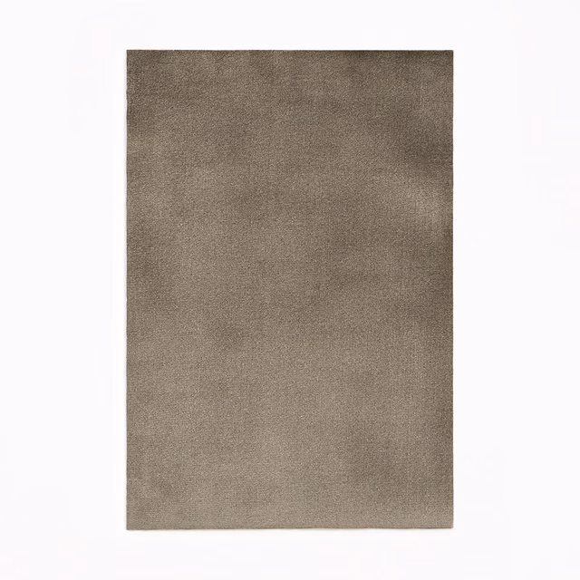 Warm taupe-brown velvet swatch showing subtle mottling and softly brushed pile