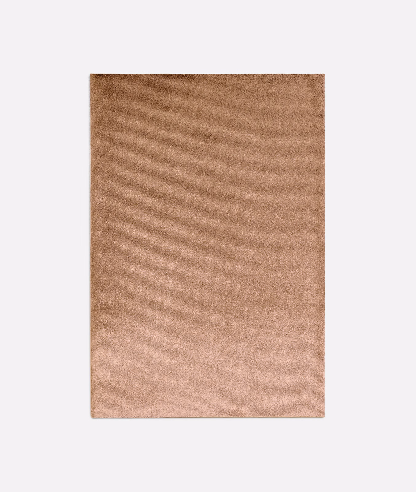 Warm peach velvet swatch with softly brushed pile and subtle tonal shading