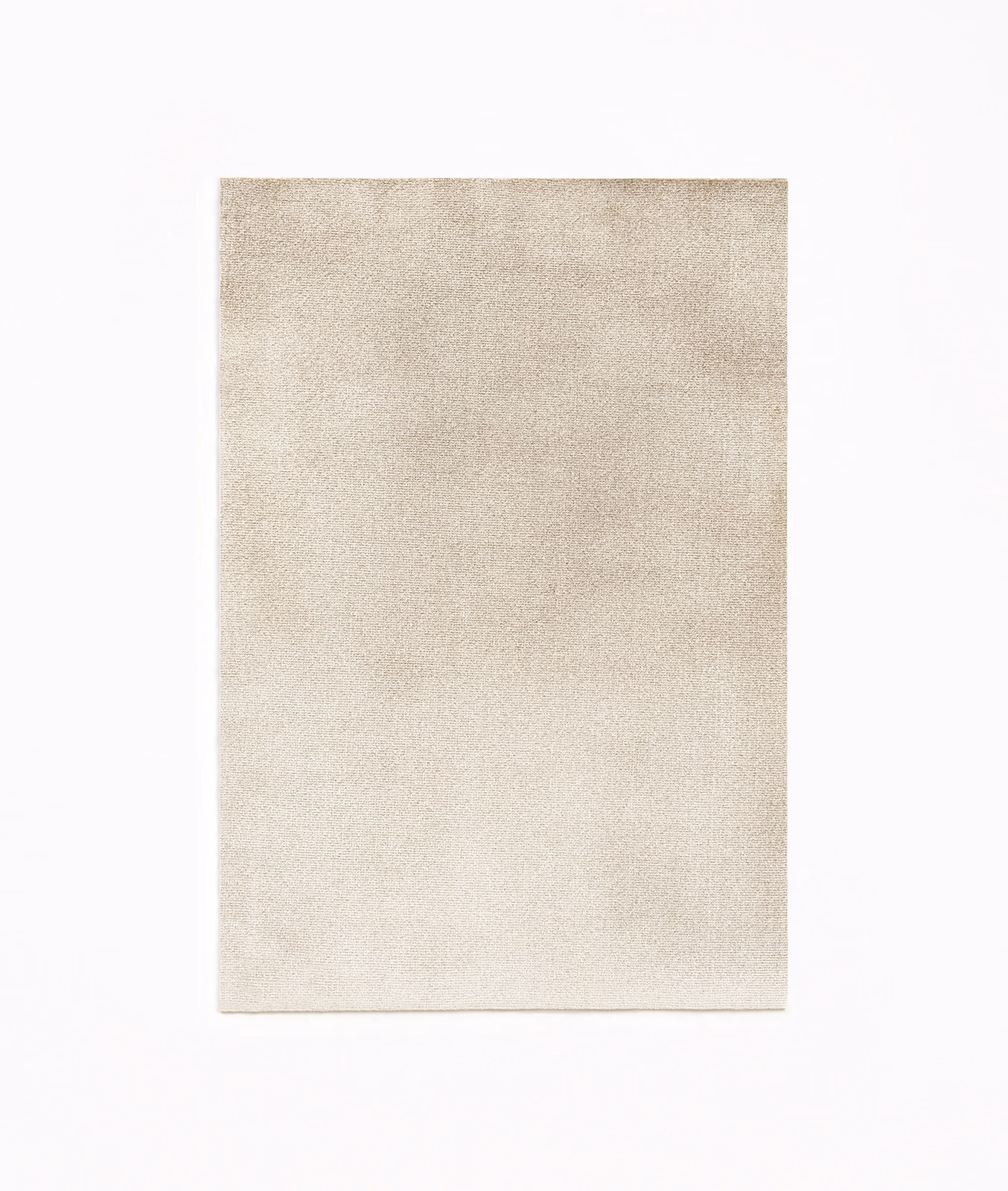 Warm pearl ivory velvet swatch showing a close nap and subtle tonal shading