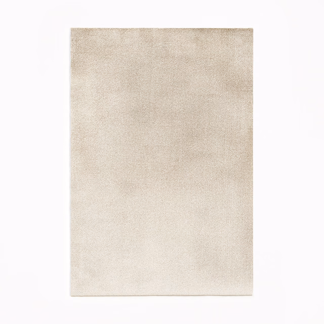 Warm pearl ivory velvet swatch showing a close nap and subtle tonal shading