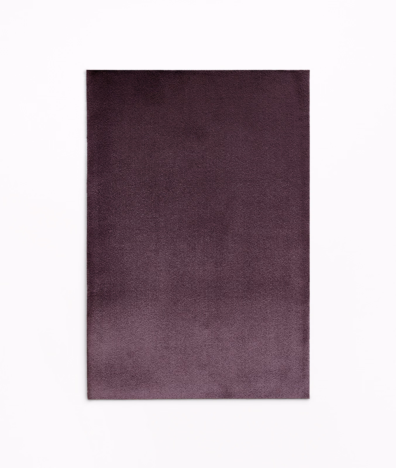 Dusky plum-purple velvet showing a soft short pile and smoky tonal variation