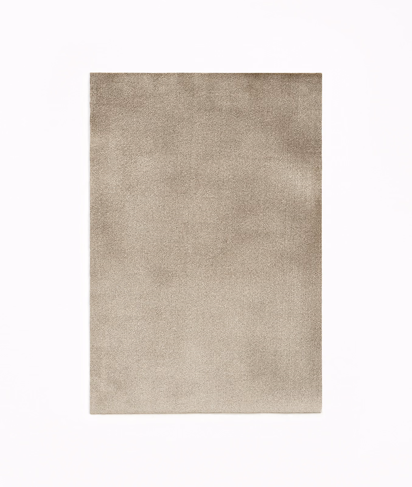Warm sand-beige velvet swatch with subtle nap variation and softly brushed surface