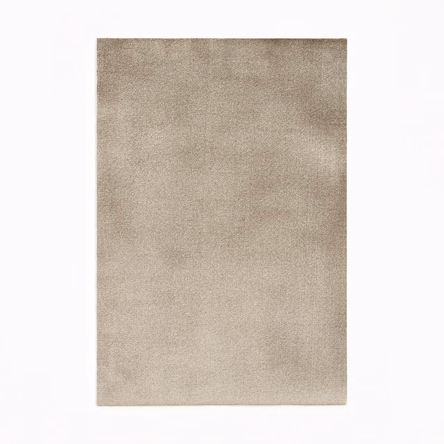 Warm sand-beige velvet swatch with subtle nap variation and softly brushed surface