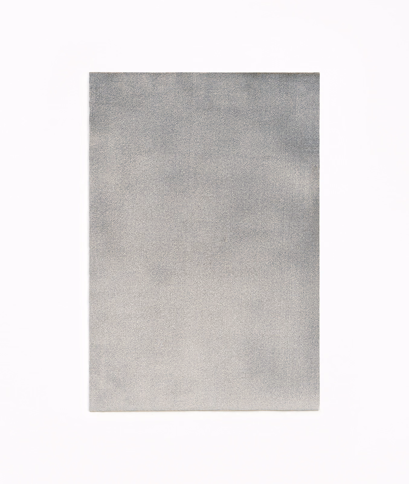 Soft smoke-grey velvet swatch with subtly mottled nap and silvery tonal shading