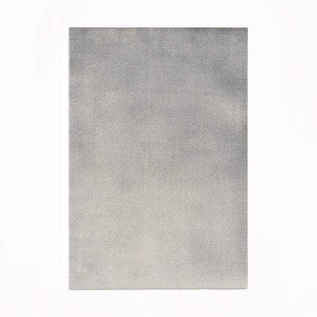 Soft smoke-grey velvet swatch with subtly mottled nap and silvery tonal shading