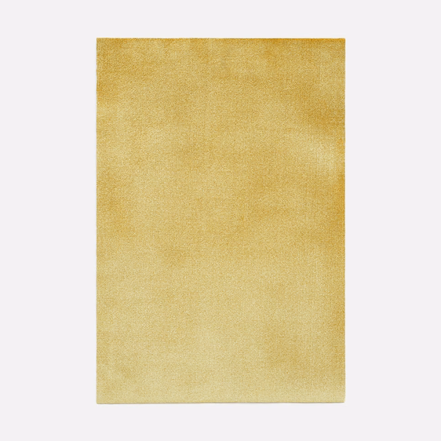 Muted sulphur-yellow velvet with a softly brushed, subtly mottled surface