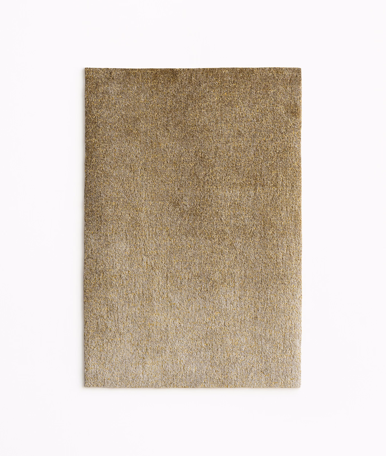Warm taupe-gold velvet swatch with fine mottled pile and subdued sheen