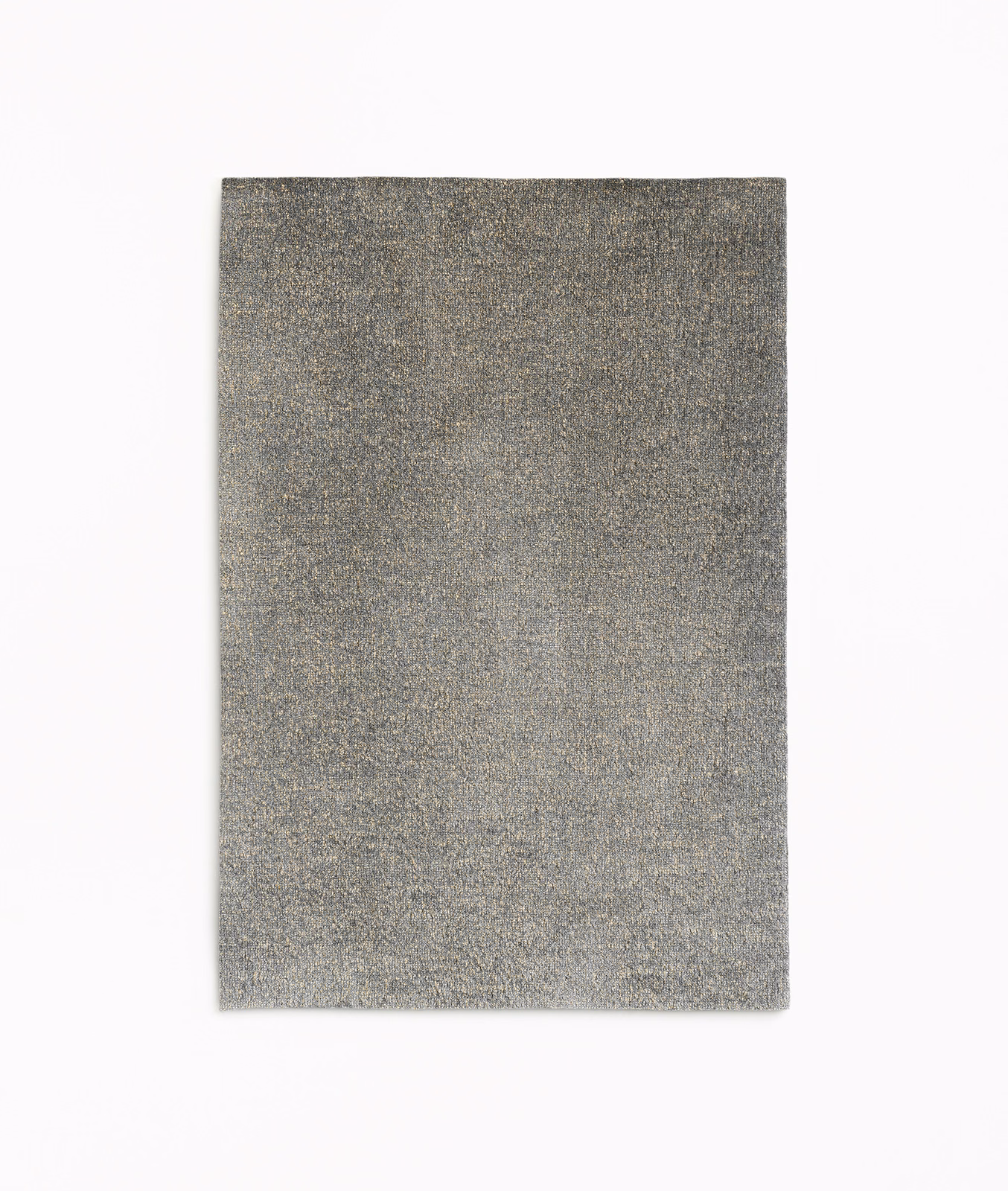 Mottled smoke-grey velvet swatch with subtle warm gold shimmer across its textured surface