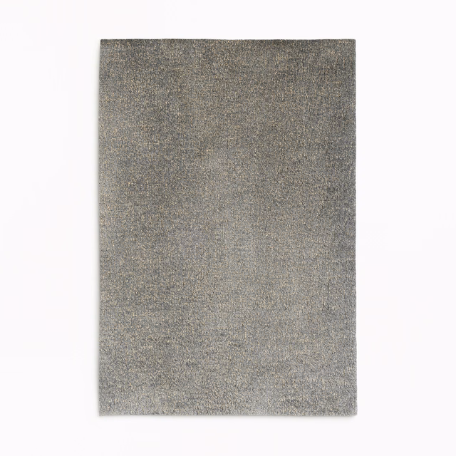 Mottled smoke-grey velvet swatch with subtle warm gold shimmer across its textured surface