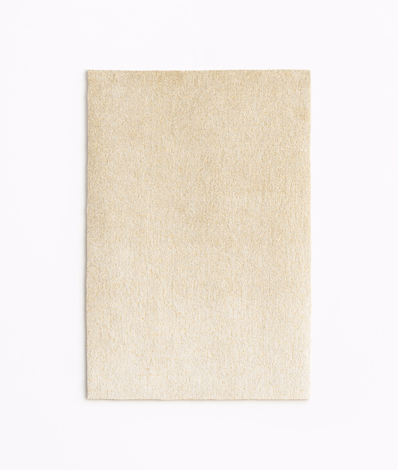 Warm ivory velvet swatch with subtle champagne-gold sheen and fine vertical texture