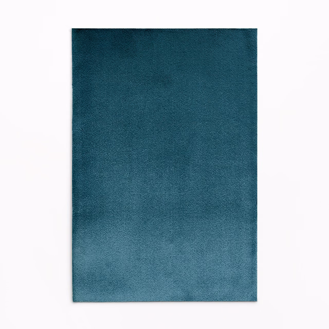 Deep storm-blue velvet swatch with blue-teal tonal shading and soft pile