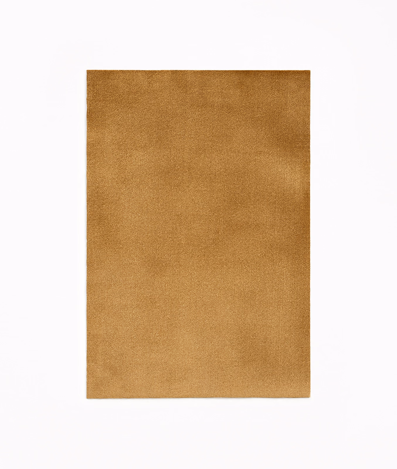 Warm toffee-brown velvet swatch showing a softly shaded, plain plush surface