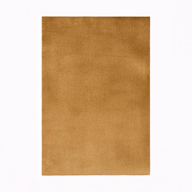 Warm toffee-brown velvet swatch showing a softly shaded, plain plush surface