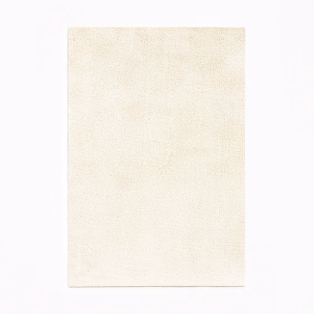 Warm ivory velvet swatch with a softly brushed, subtly shaded plain surface