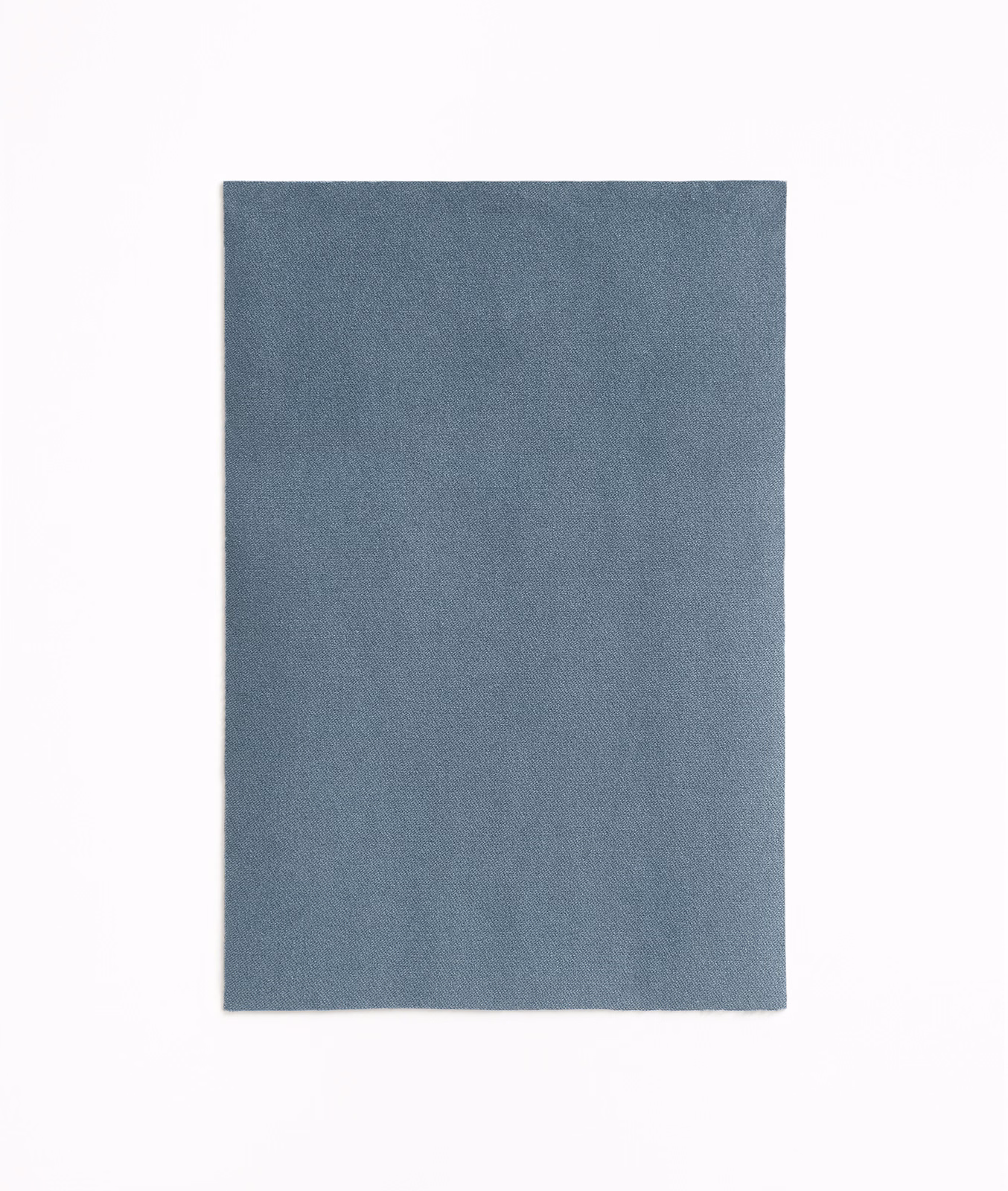 Plain steel blue-grey velvet swatch showing a softly directional brushed pile