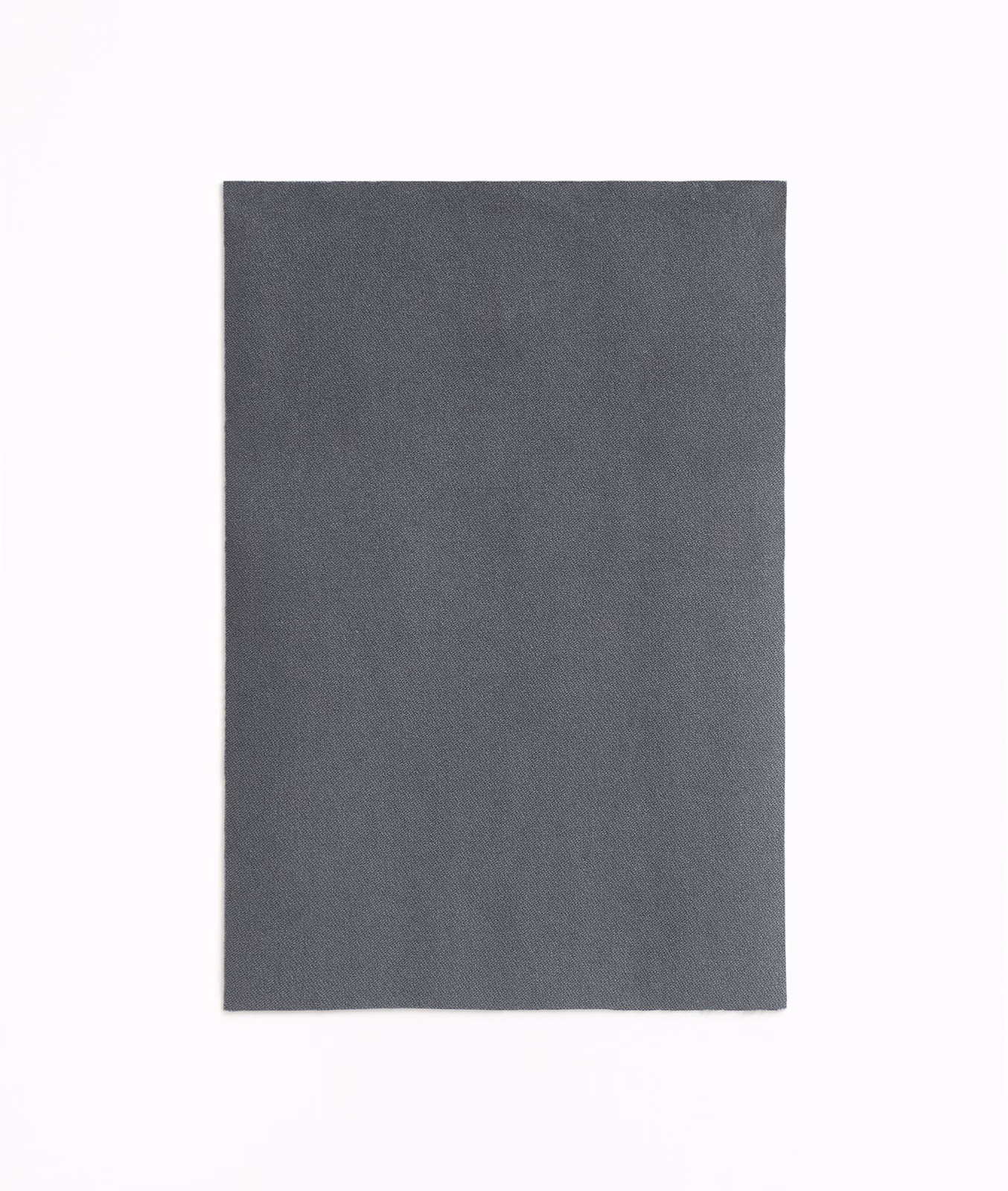 Deep charcoal-grey velvet swatch with a soft, subtly directional pile