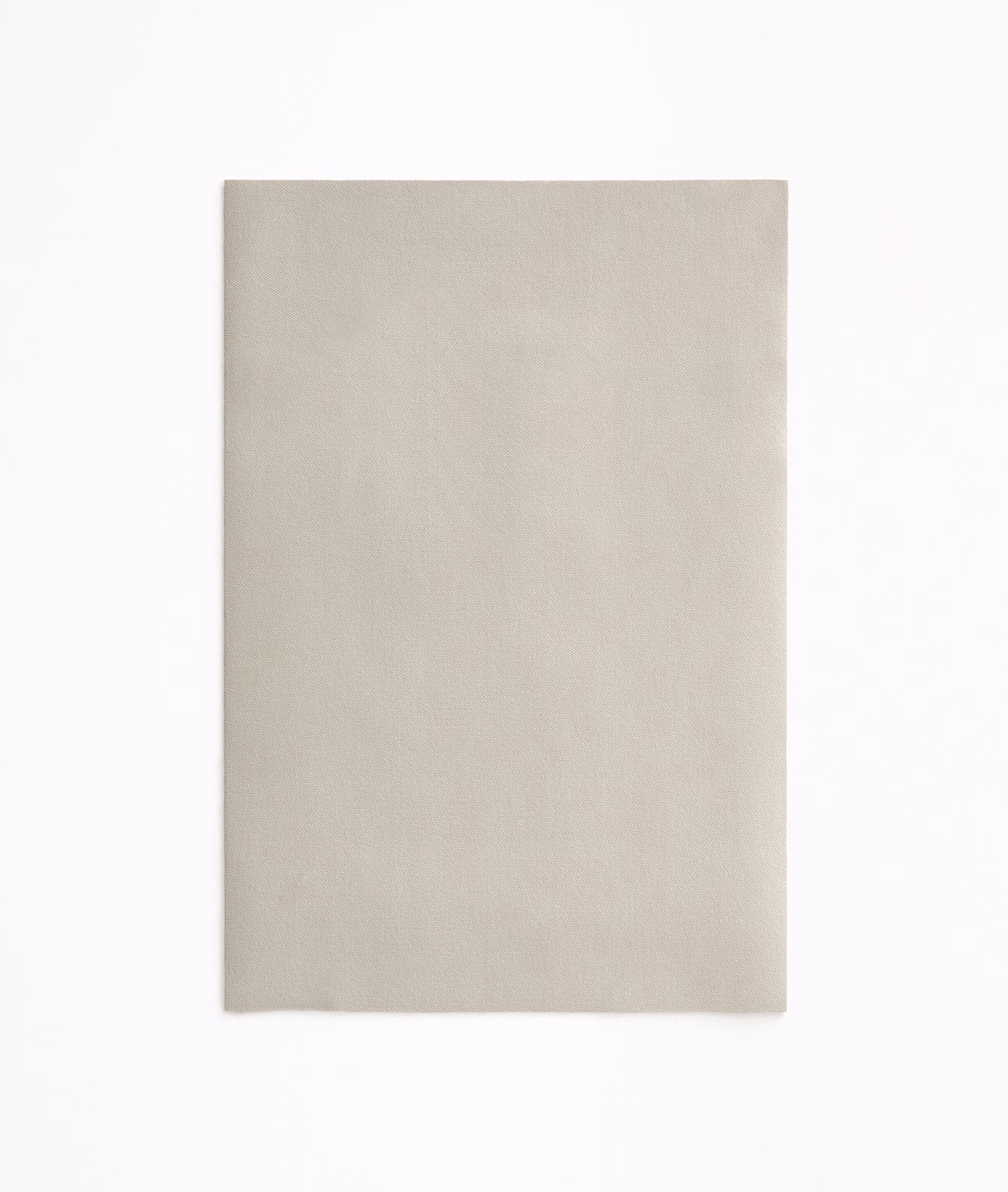 Warm beige velvet swatch with an even, softly light-catching pile