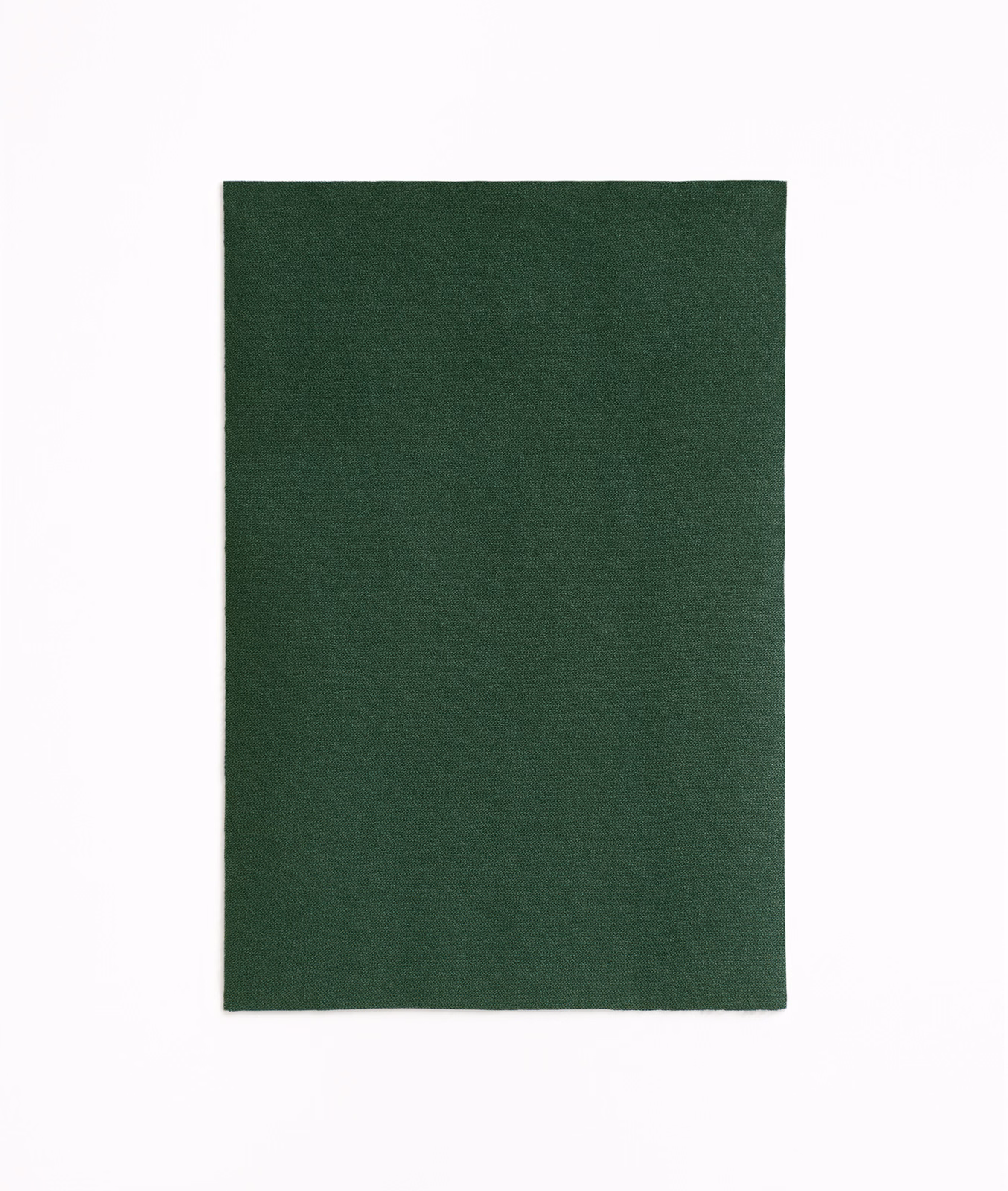Deep bottle-green velvet with a quiet, finely brushed pile