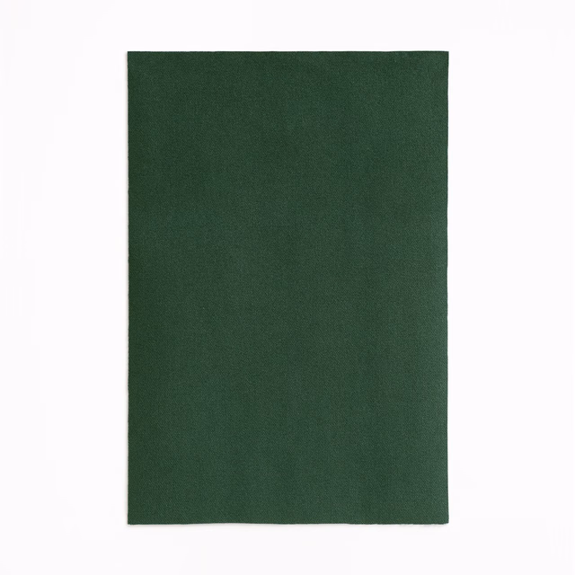 Deep bottle-green velvet with a quiet, finely brushed pile