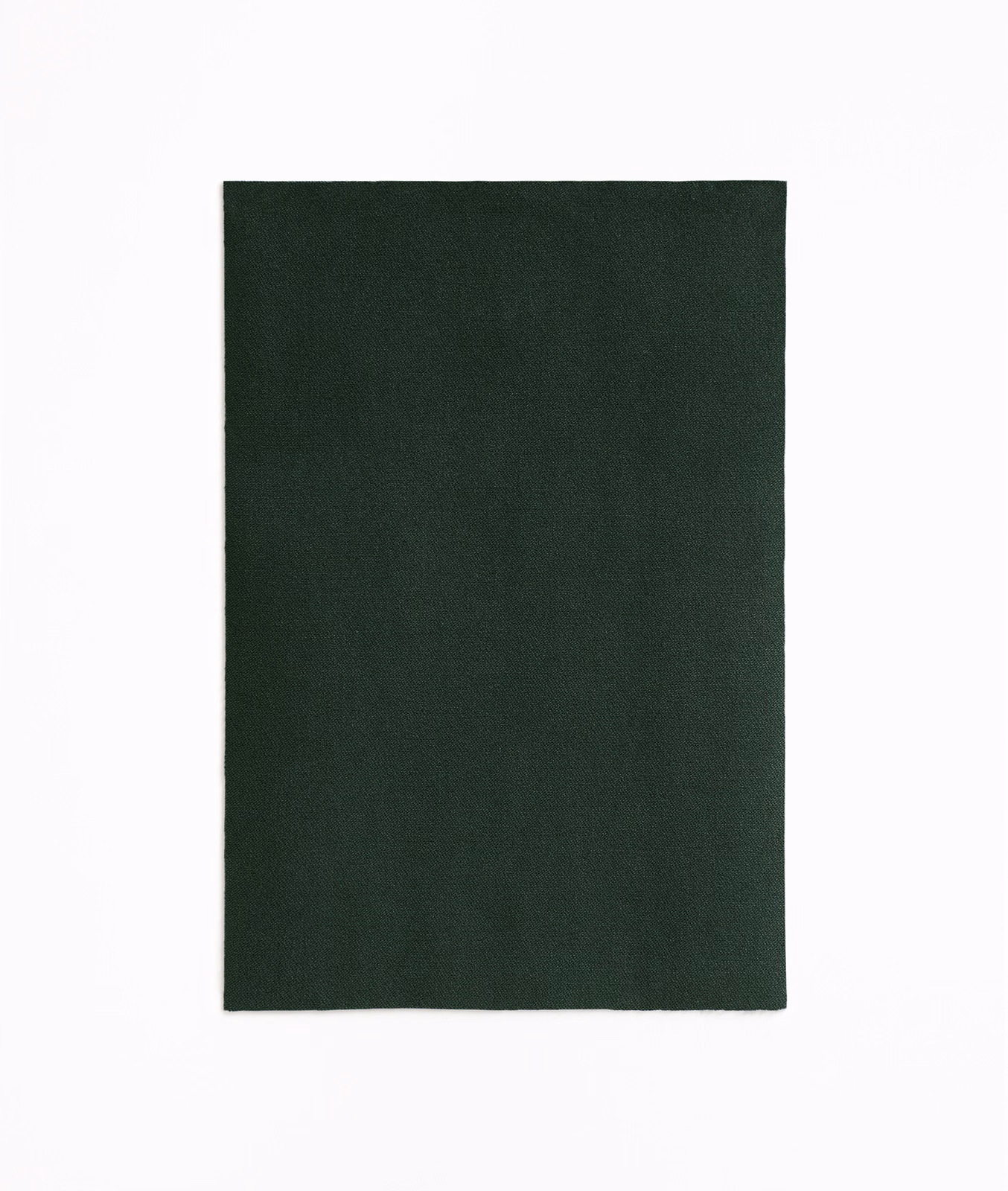 Deep forest-green velvet swatch with a low, subtly directional nap
