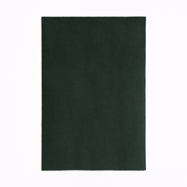 Deep forest-green velvet swatch with a low, subtly directional nap