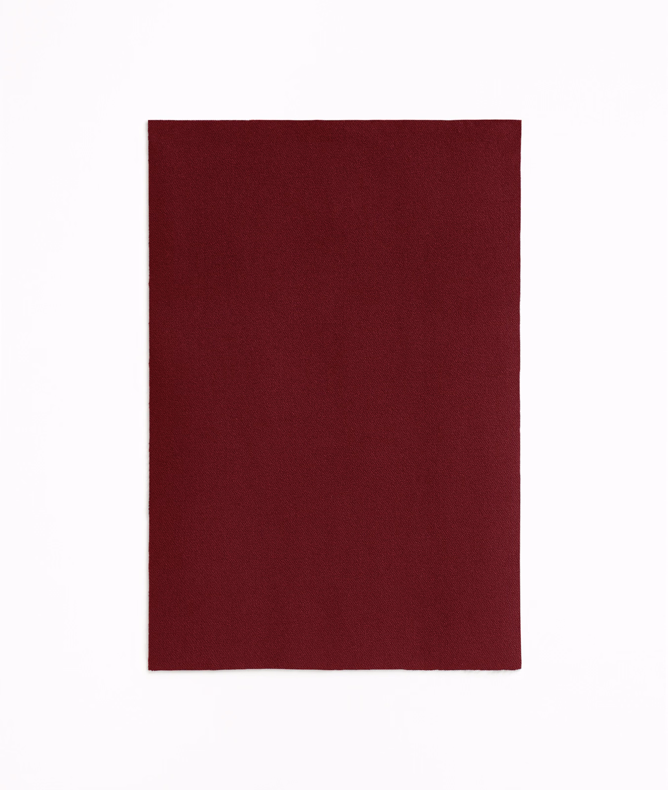 Deep cayenne burgundy velvet swatch with a dense, subtly shifting pile