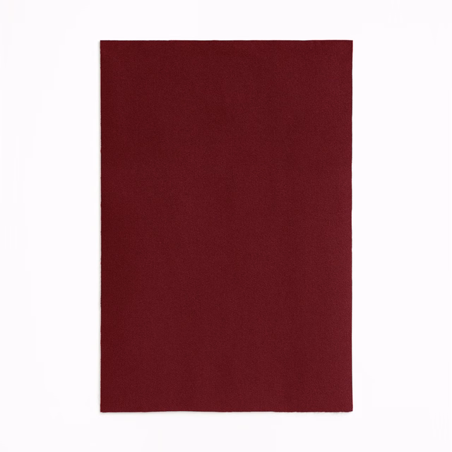 Deep cayenne burgundy velvet swatch with a dense, subtly shifting pile