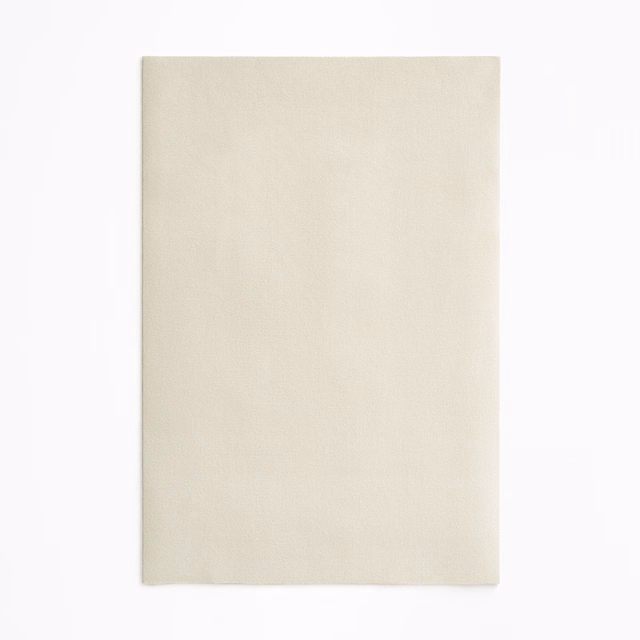 Warm ivory velvet swatch with a softly brushed, subtly shaded plain surface