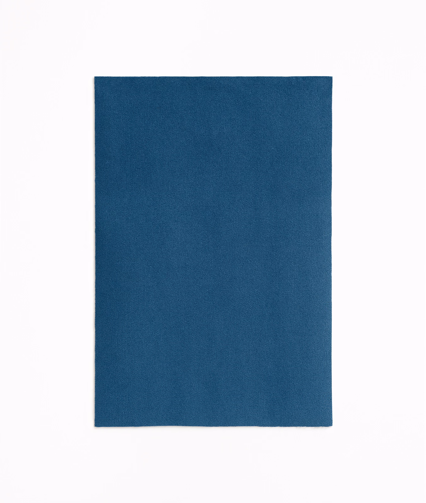 Deep indigo-blue velvet swatch showing a subtle directional nap