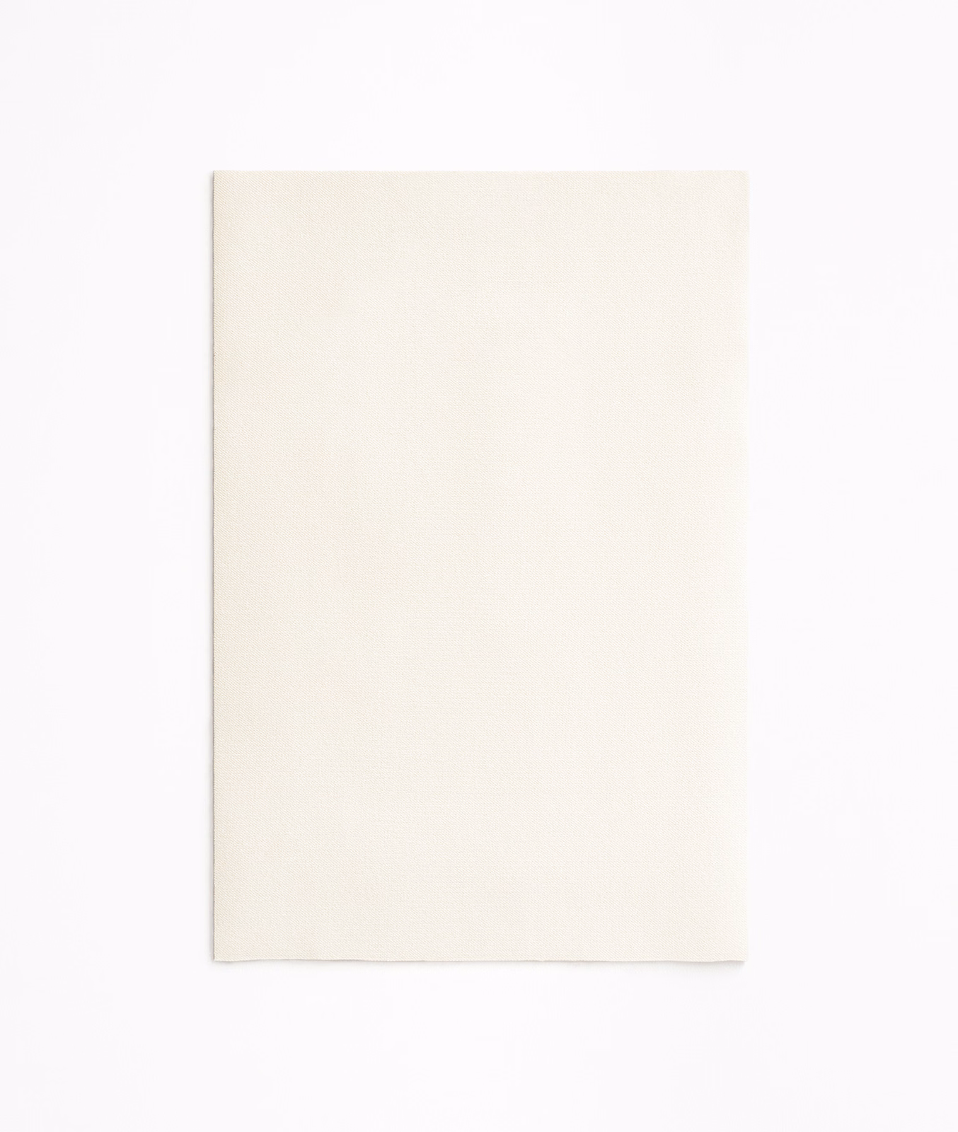 Plain warm ivory velvet swatch with a soft, subtly brushed surface