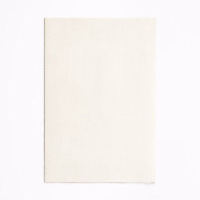 Plain warm ivory velvet swatch with a soft, subtly brushed surface