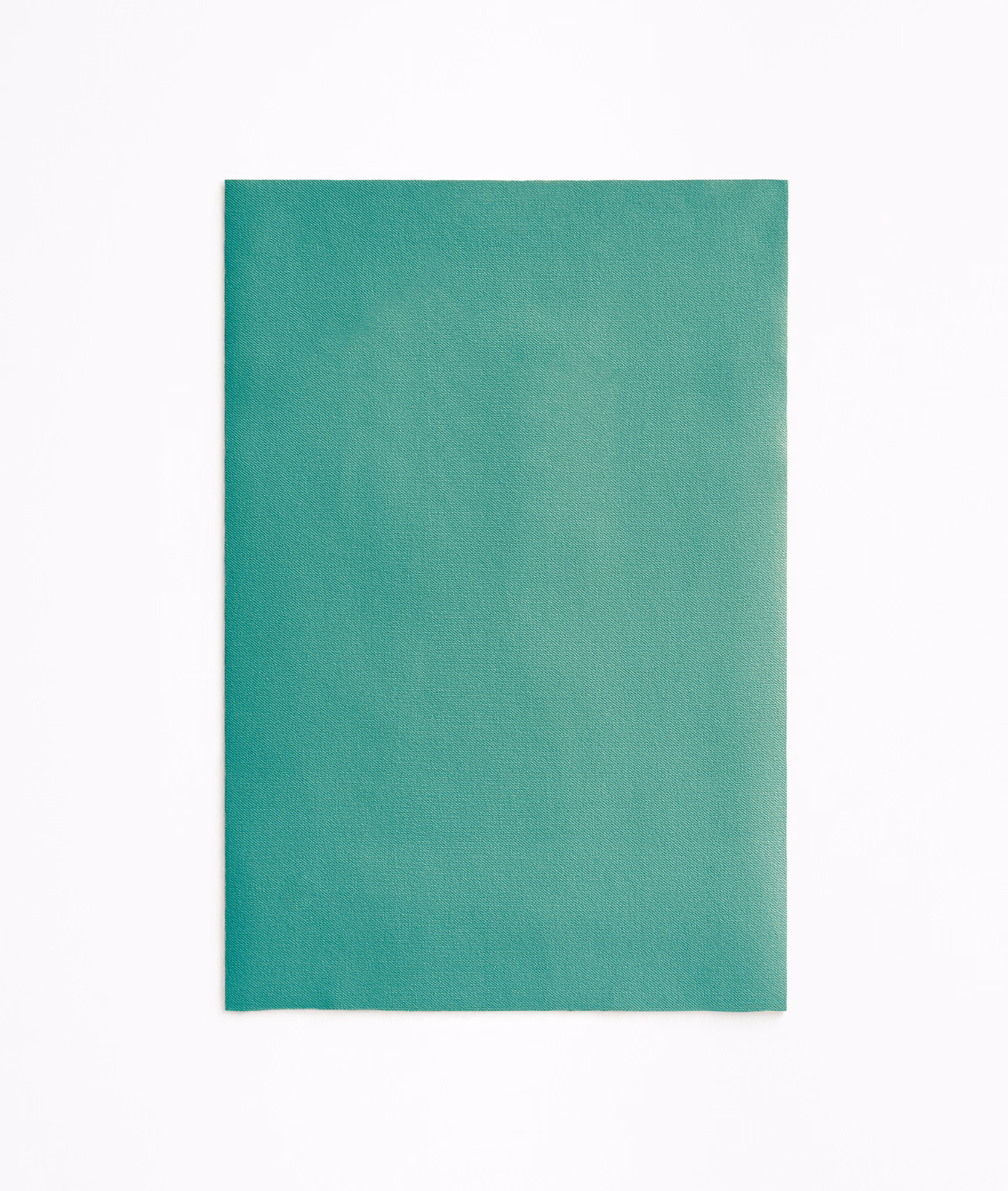 Saturated malachite teal velvet with a softly shifting plain nap