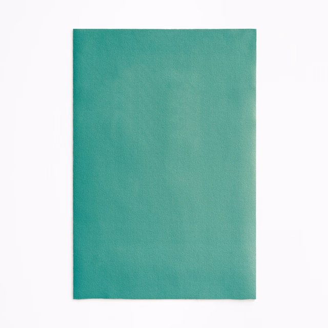 Saturated malachite teal velvet with a softly shifting plain nap