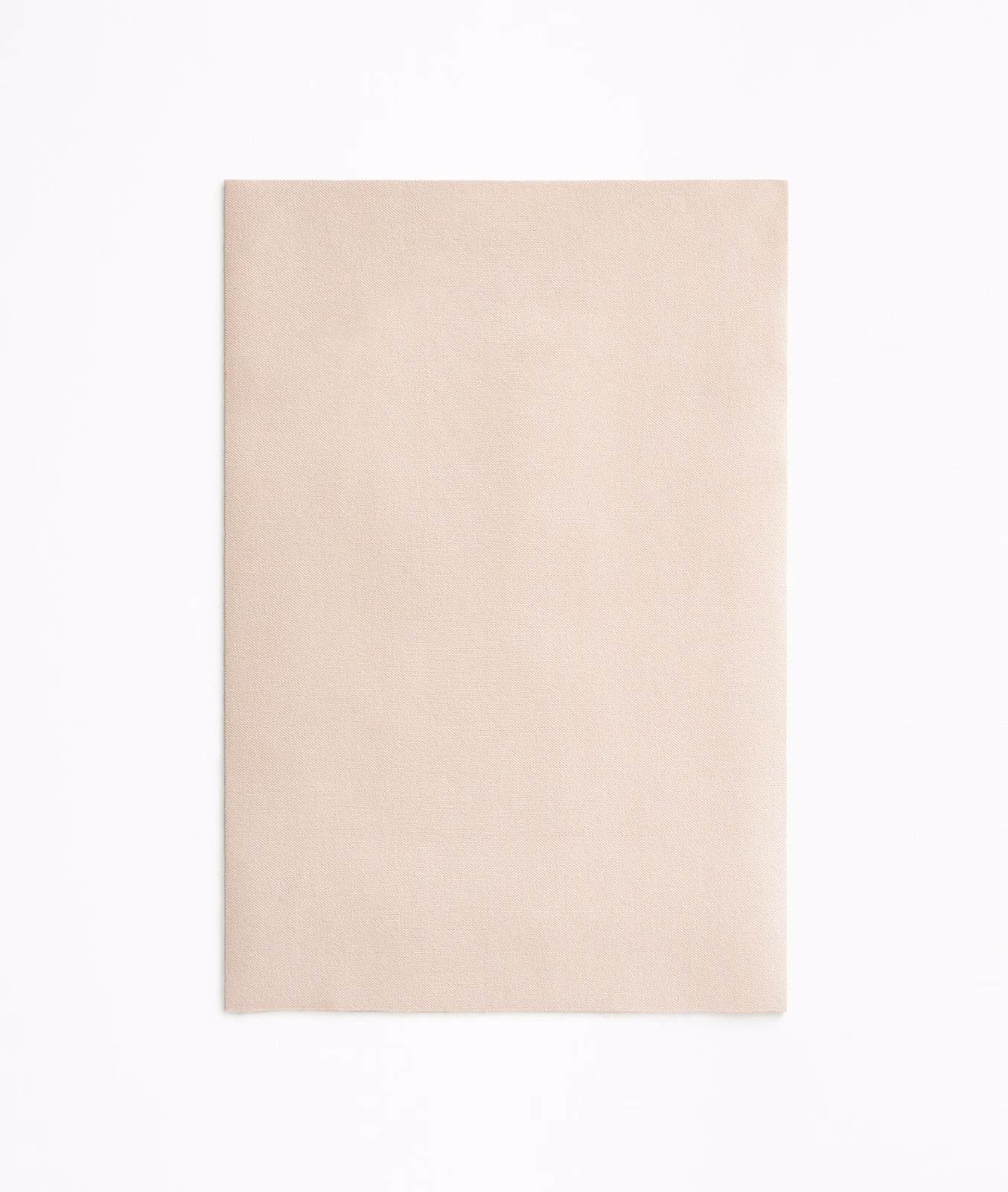 Pale blush-beige velvet swatch with a quiet, softly reflective nap